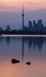 Preview wallpaper city, buildings, lake, water, reflection, dusk