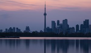 Preview wallpaper city, buildings, lake, water, reflection, dusk