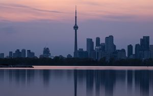 Preview wallpaper city, buildings, lake, water, reflection, dusk