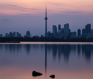 Preview wallpaper city, buildings, lake, water, reflection, dusk