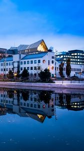 Preview wallpaper city, buildings, lake, reflection, twilight