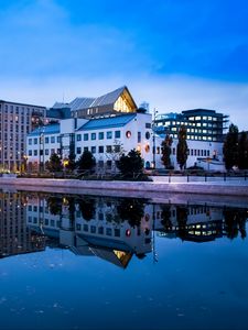 Preview wallpaper city, buildings, lake, reflection, twilight