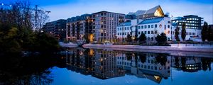 Preview wallpaper city, buildings, lake, reflection, twilight