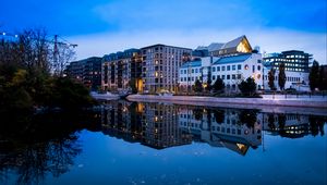 Preview wallpaper city, buildings, lake, reflection, twilight