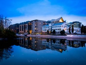 Preview wallpaper city, buildings, lake, reflection, twilight