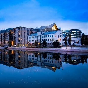 Preview wallpaper city, buildings, lake, reflection, twilight