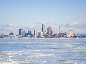 Preview wallpaper city, buildings, lake, ice, winter