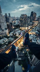 Preview wallpaper city, buildings, legs, aerial view