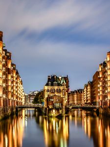 Preview wallpaper city, buildings, light, river, reflection, twilight