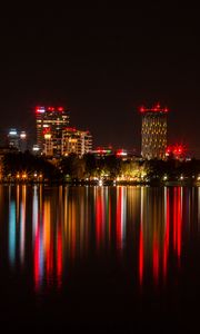 Preview wallpaper city, buildings, lights, glow, reflection
