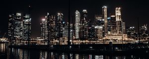Preview wallpaper city, buildings, lights, night, water, reflection