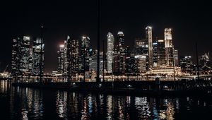 Preview wallpaper city, buildings, lights, night, water, reflection