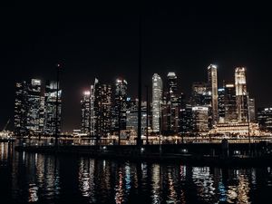 Preview wallpaper city, buildings, lights, night, water, reflection