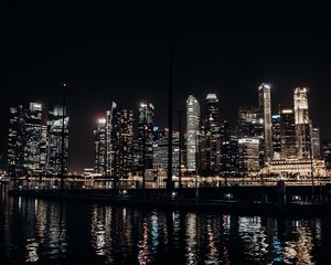 Preview wallpaper city, buildings, lights, night, water, reflection