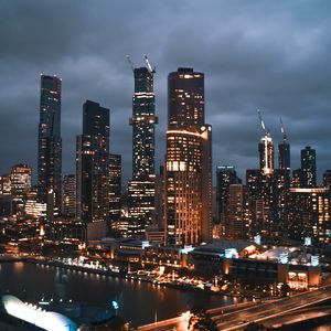 Preview wallpaper city, buildings, lights, clouds, twilight