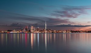 Preview wallpaper city, buildings, lights, reflection, twilight