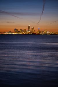 Preview wallpaper city, buildings, lights, water, twilight