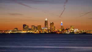 Preview wallpaper city, buildings, lights, water, twilight