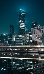 Preview wallpaper city, buildings, lights, water, reflection, night