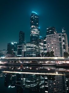 Preview wallpaper city, buildings, lights, water, reflection, night
