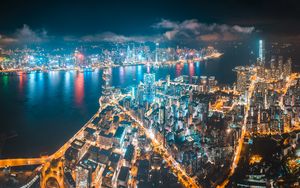 Preview wallpaper city, buildings, lights, water, aerial view