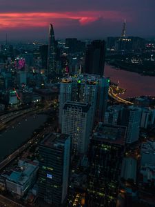 Preview wallpaper city, buildings, lights, aerial view, twilight