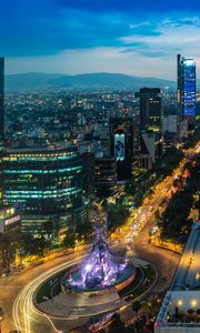 Preview wallpaper city, buildings, lights, road, twilight, aerial view