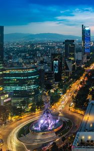 Preview wallpaper city, buildings, lights, road, twilight, aerial view