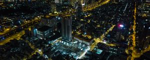 Preview wallpaper city, buildings, lights, road, aerial view, night, dark