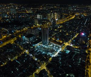 Preview wallpaper city, buildings, lights, road, aerial view, night, dark