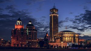 Preview wallpaper city, buildings, lights, water, twilight, dark
