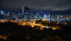 Preview wallpaper city, buildings, lights, road, metropolis, twilight