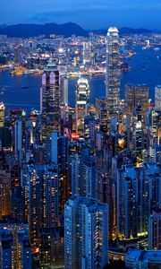 Preview wallpaper city, buildings, metropolis, lights, aerial view, twilight