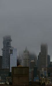 Preview wallpaper city, buildings, metropolis, fog, haze