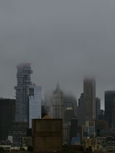 Preview wallpaper city, buildings, metropolis, fog, haze