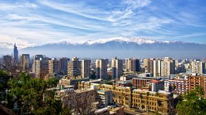 Preview wallpaper city, buildings, mountains, aerial view