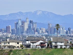 Preview wallpaper city, buildings, mountains, cityscape