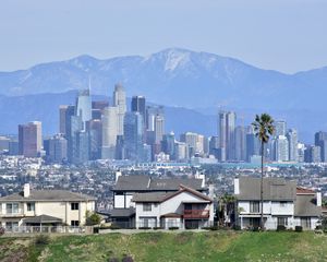 Preview wallpaper city, buildings, mountains, cityscape