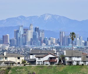 Preview wallpaper city, buildings, mountains, cityscape