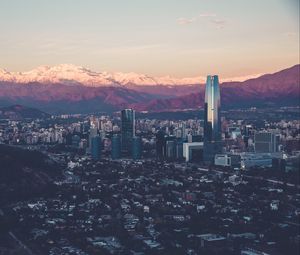 Preview wallpaper city, buildings, mountains, valley