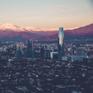 Preview wallpaper city, buildings, mountains, valley