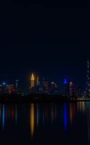 Preview wallpaper city, buildings, night, coast, water, reflection, dark