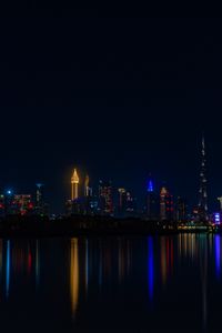 Preview wallpaper city, buildings, night, coast, water, reflection, dark
