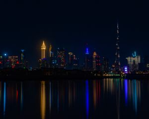 Preview wallpaper city, buildings, night, coast, water, reflection, dark