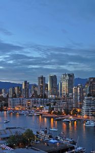 Preview wallpaper city, buildings, pier, water, twilight