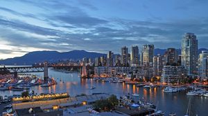 Preview wallpaper city, buildings, pier, water, twilight