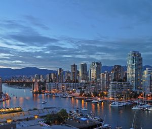 Preview wallpaper city, buildings, pier, water, twilight