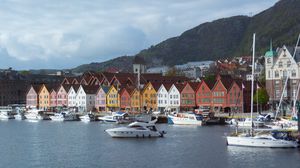 Preview wallpaper city, buildings, pier, boats, water