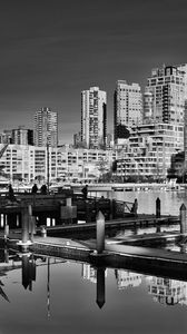 Preview wallpaper city, buildings, pier, black and white