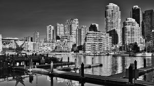 Preview wallpaper city, buildings, pier, black and white
